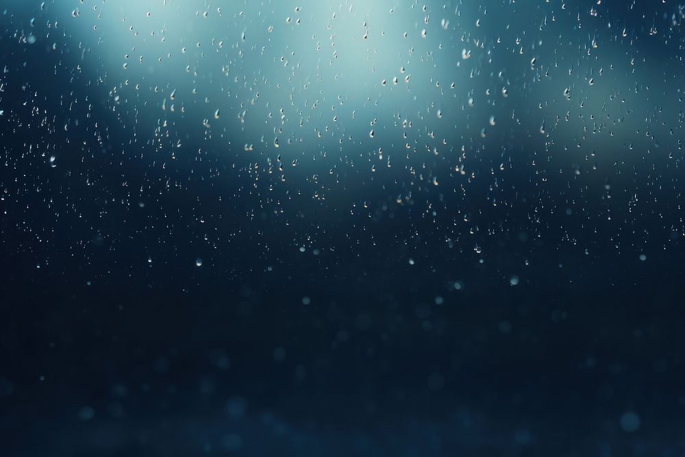 Rain on dark background backgrounds abstract night.