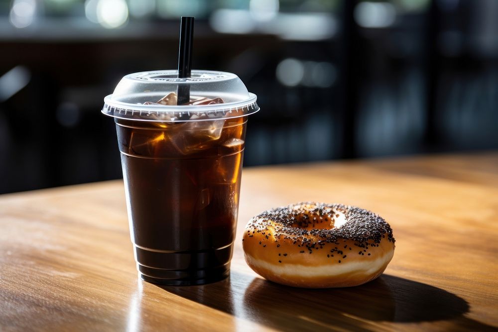 Plastic cup coffee bread table.