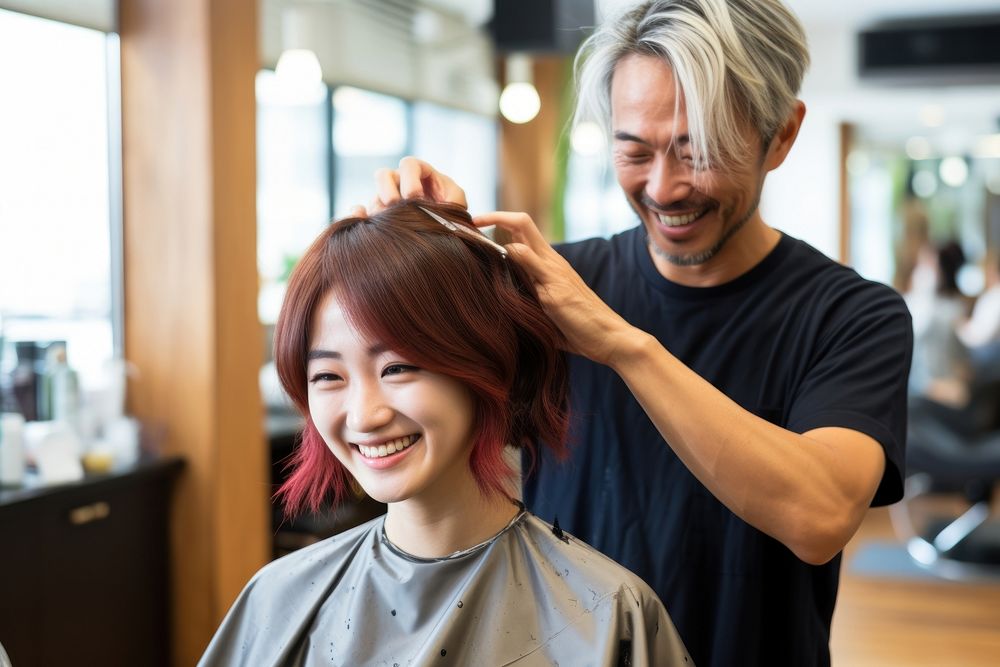Hairdresser styling hair customer adult togetherness.