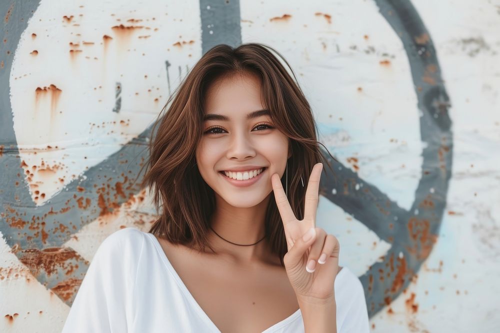 Thai woman with two finger person adult smile.
