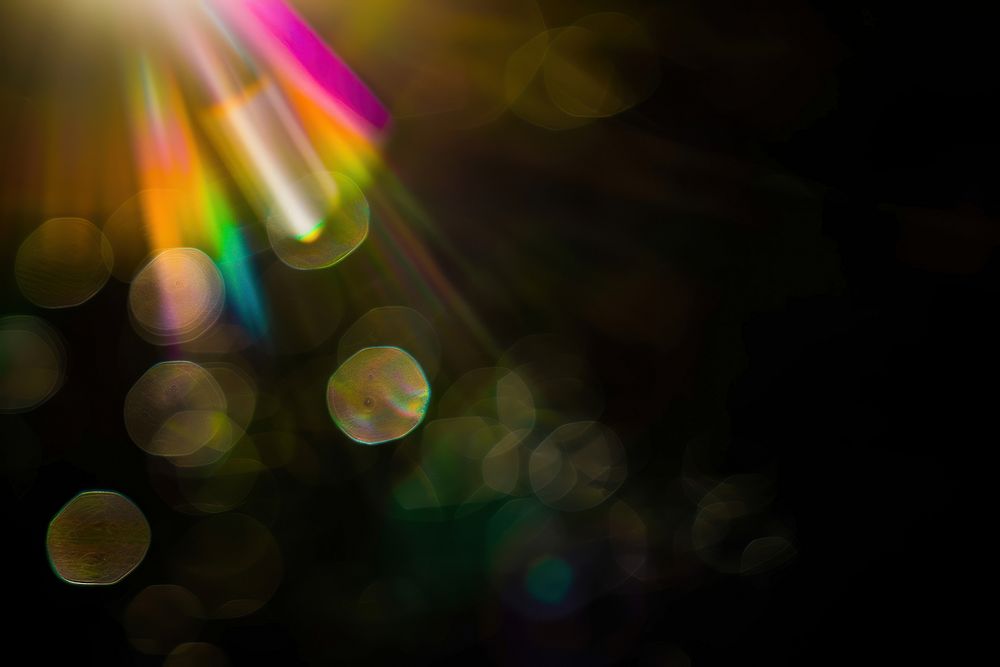 Rainbow flare light backgrounds night.