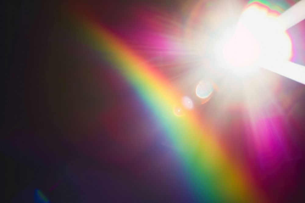 Rainbow flare light backgrounds sunlight.