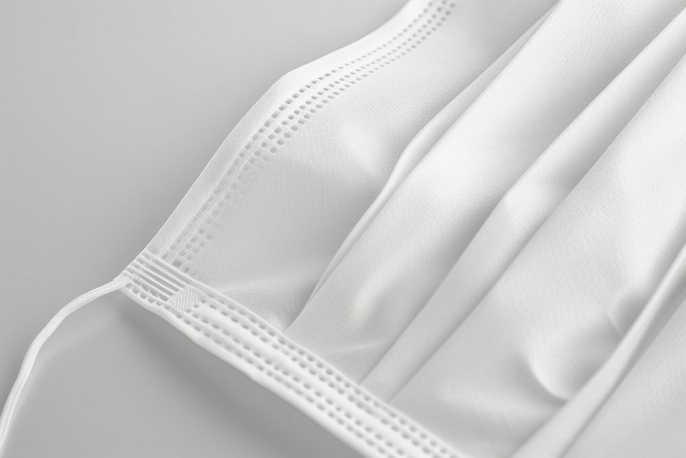 Medical mask white textile pattern.