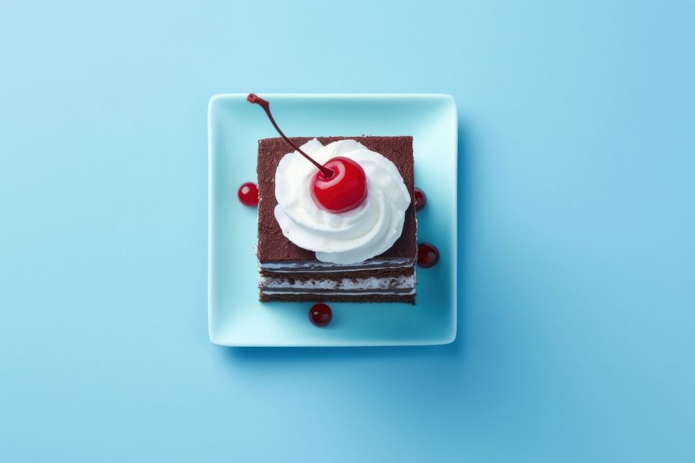 A piece of cake dessert cream food.