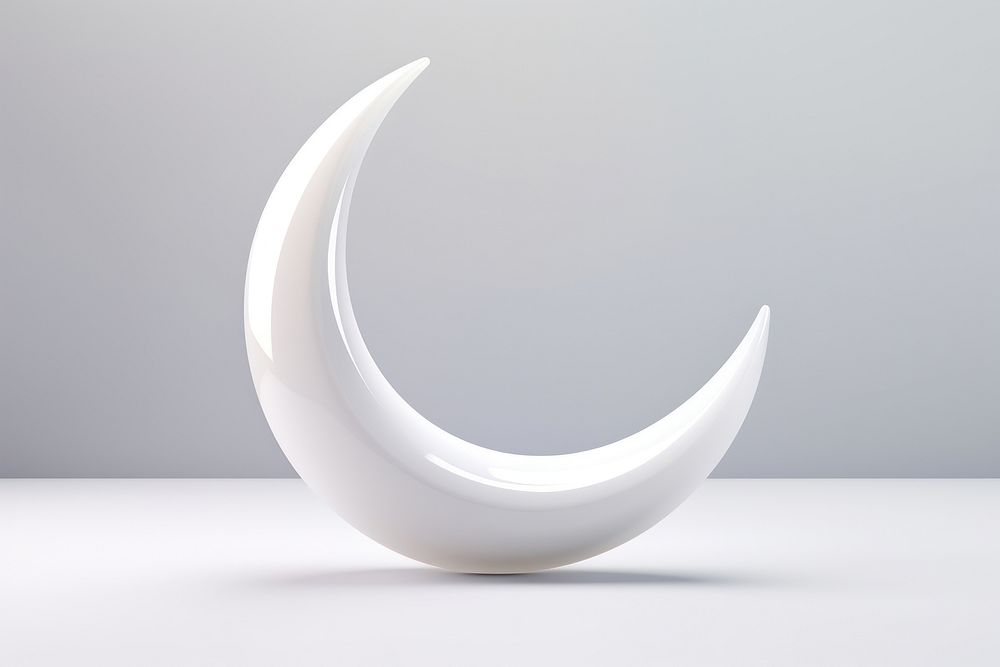 Minimal crescent moon shape white electronics.