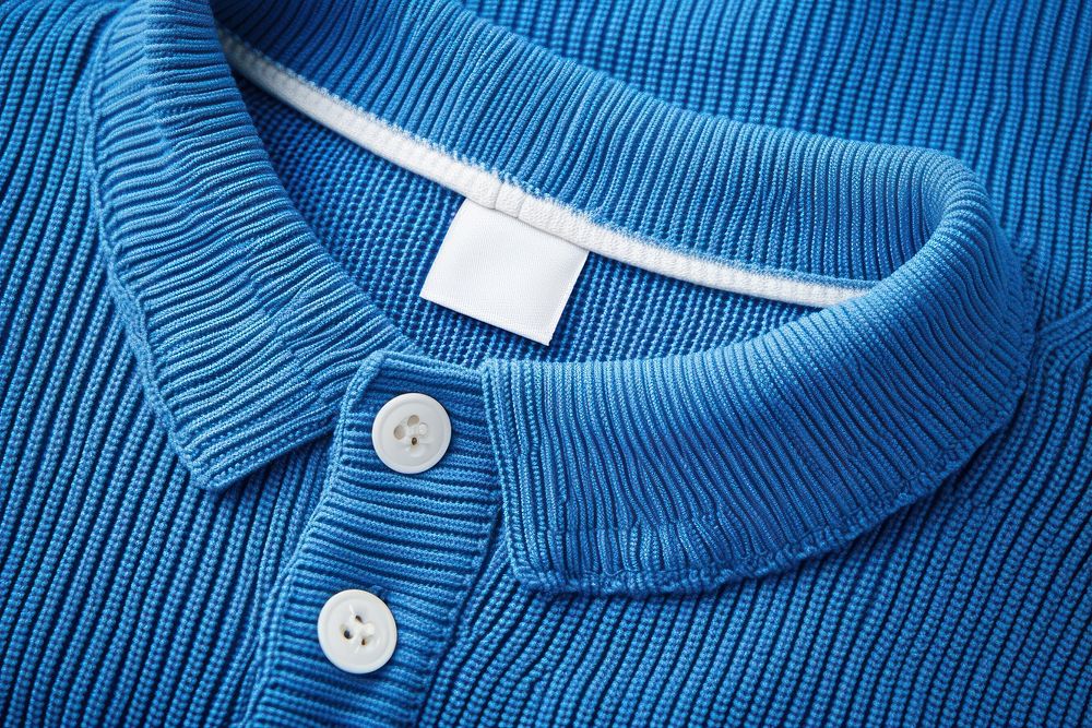Empty white label tag printing inside neck blue ribbed knit polo shirt sweater backgrounds outerwear.