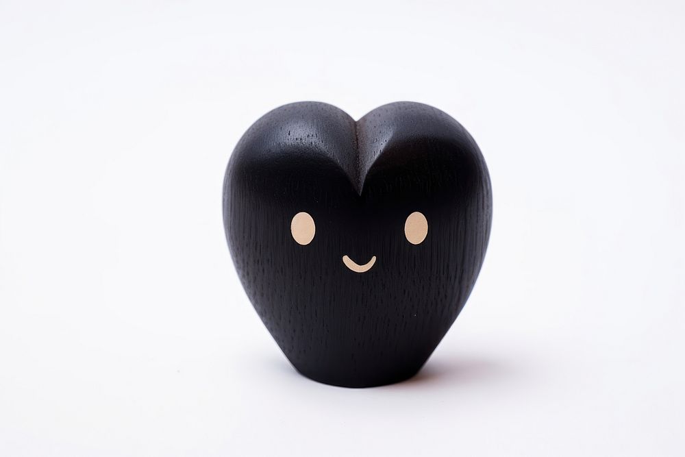 Cute black heart toy white background anthropomorphic.