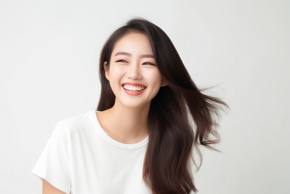 Portrait of positive cheerful asian pretty girl portrait laughing adult.