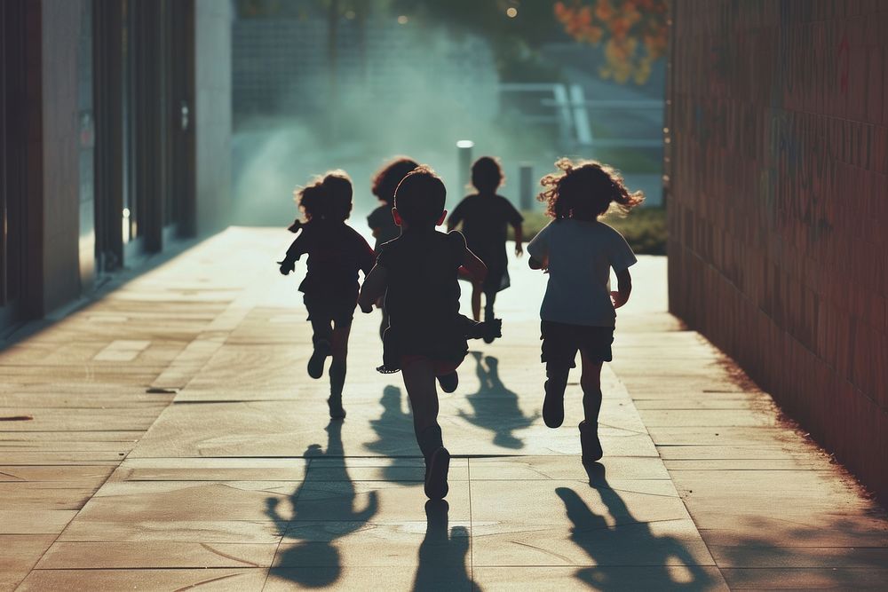 Kids running walking street.