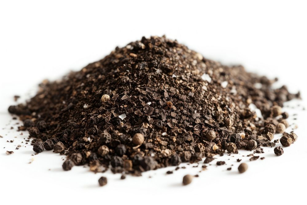 Ground black pepper flakes plant soil seed.