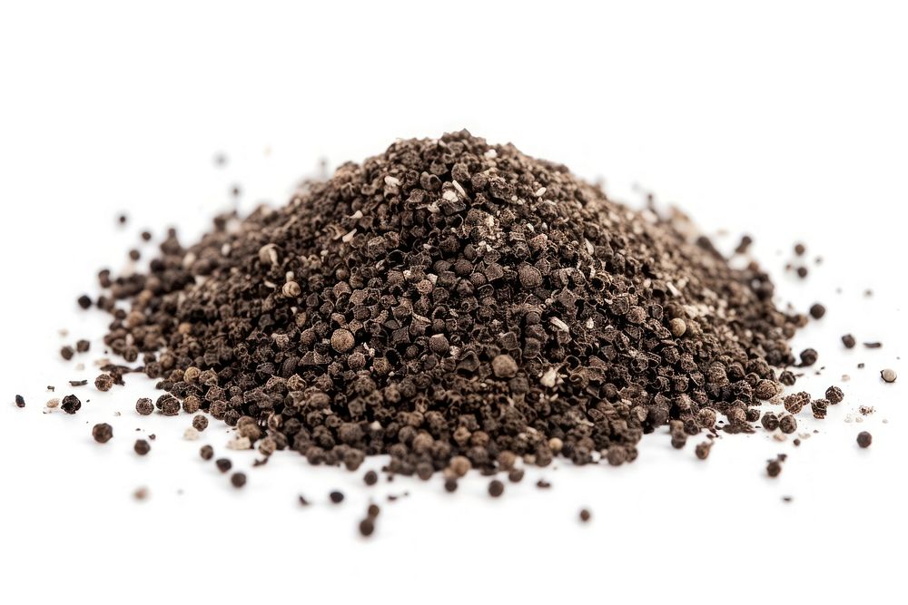 Ground black pepper flakes food seed soil.