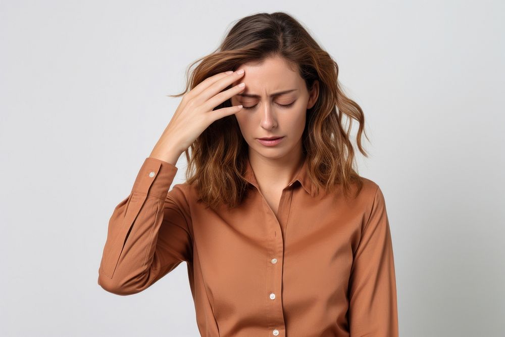 Woman doing facepalm anxiety adult photo.