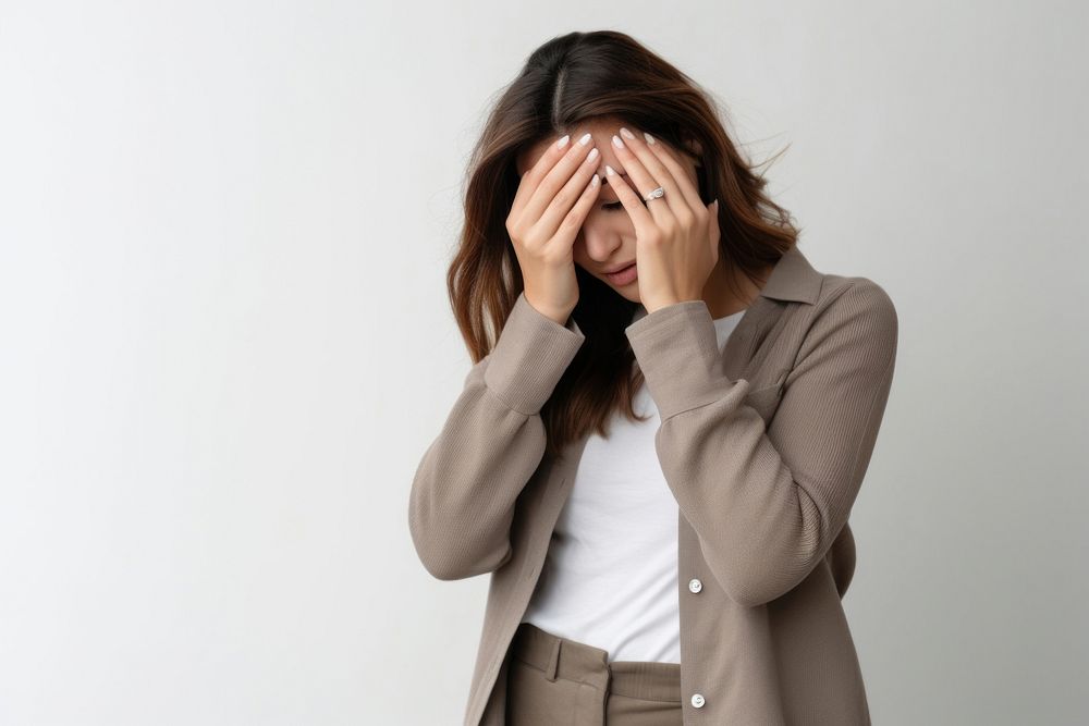 Woman doing facepalm anxiety photo pain.