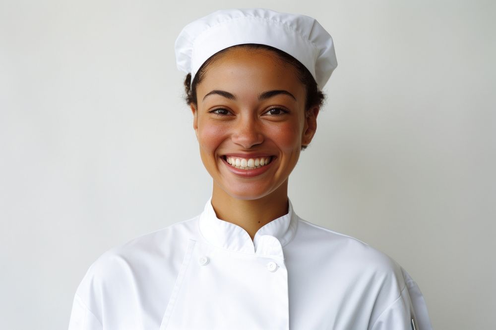 Arican-American female chef smilling smile happiness freshness.