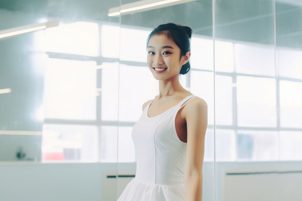 Asian ballerina smilling in the dance studion adult smile architecture.