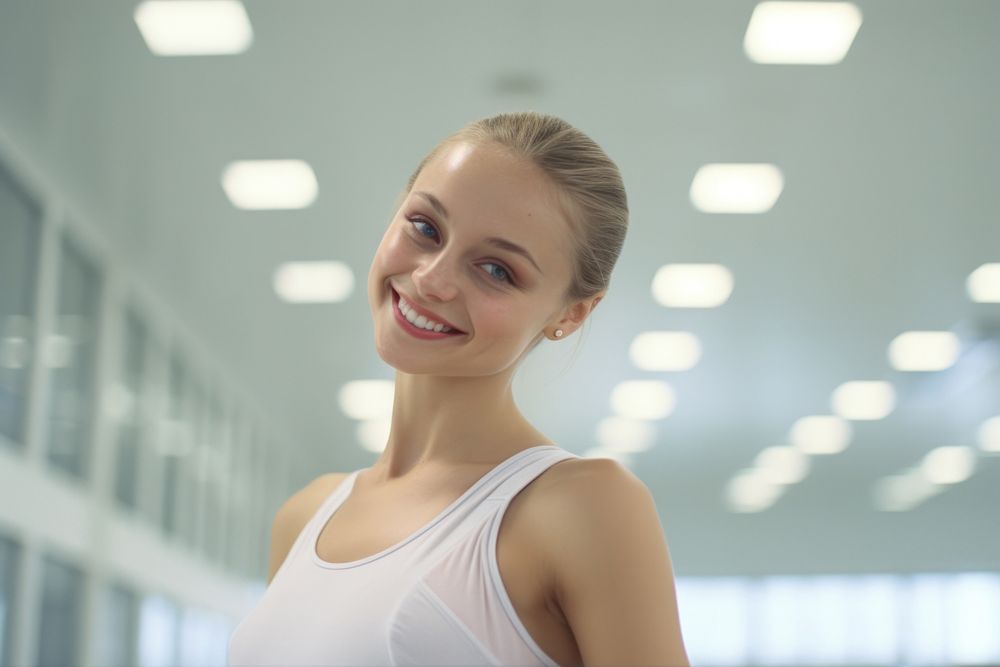 Ballerina smilling in the dance studion smile adult exercising.
