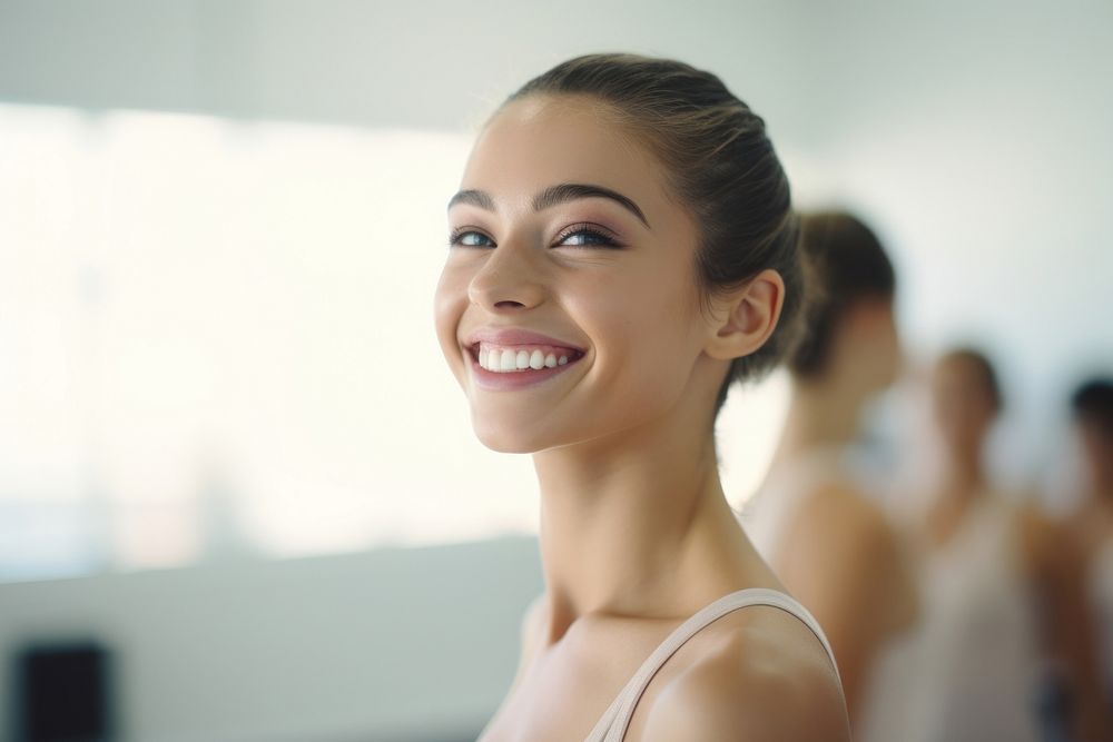 Ballerina smilling in the dance studion adult smile exercising.