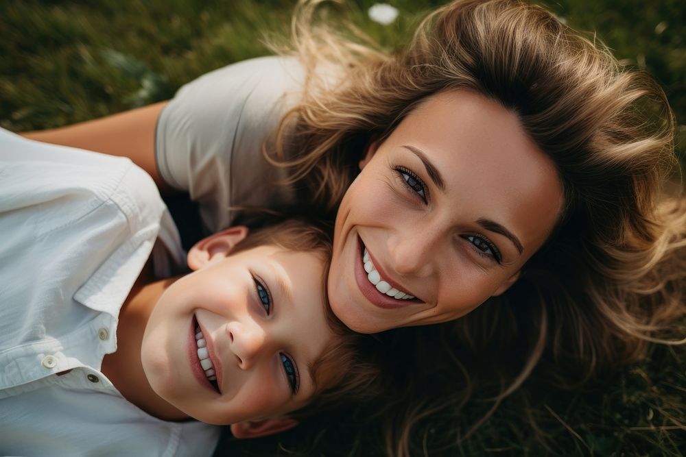Mother and son smile laughing portrait.