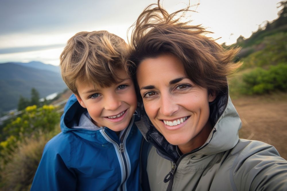 Mother and son selfie mountain portrait.