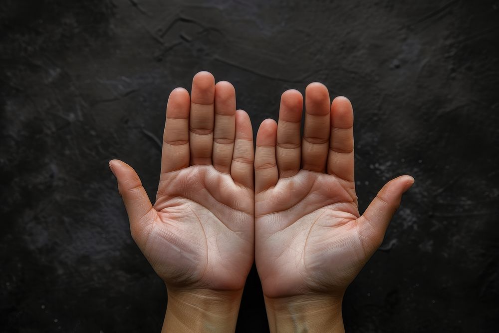 Human hands open palm up worship finger human gesturing.