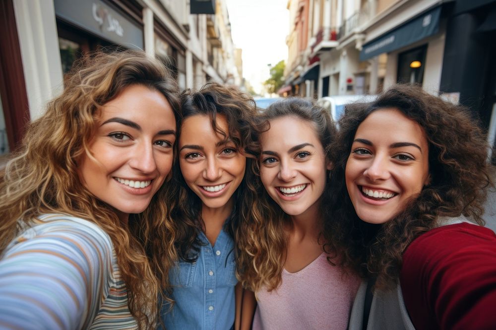 Women friends selfie laughing portrait.