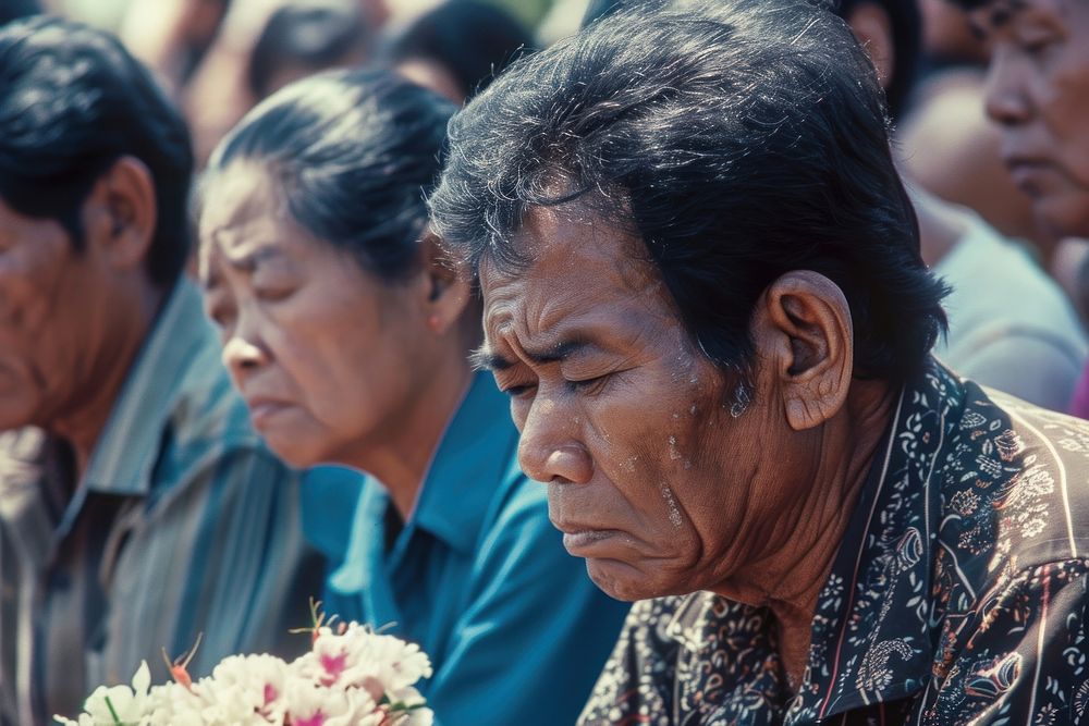 Thai people crying at the Thai funeral adult men sad.