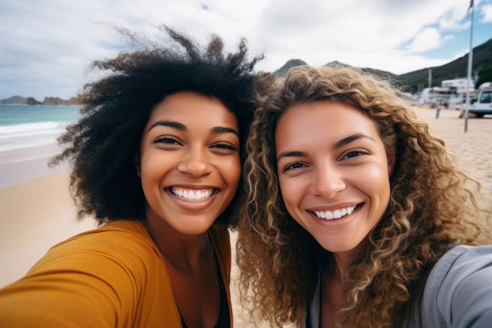 2 women friends selfie laughing portrait.