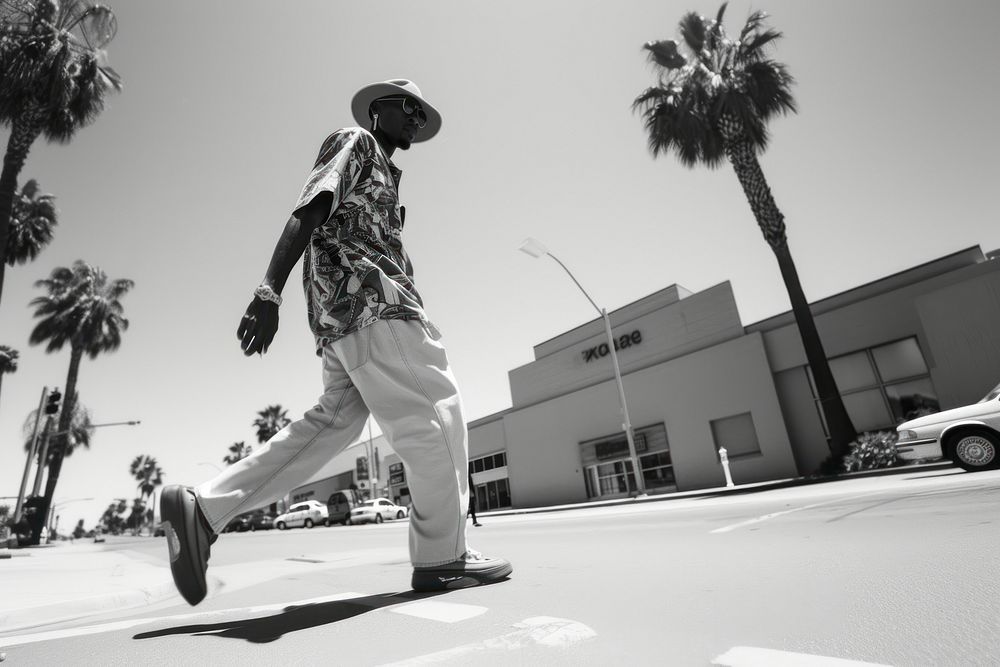 Black man Rapper walking street footwear.