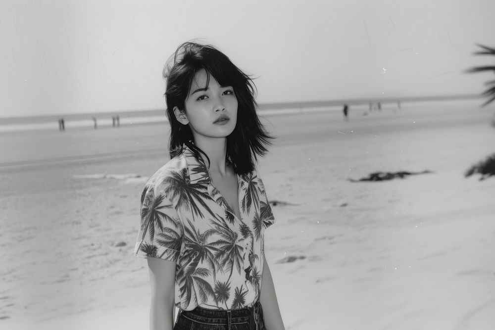 Young asian woman wearing Hawaii shirts beach portrait outdoors.