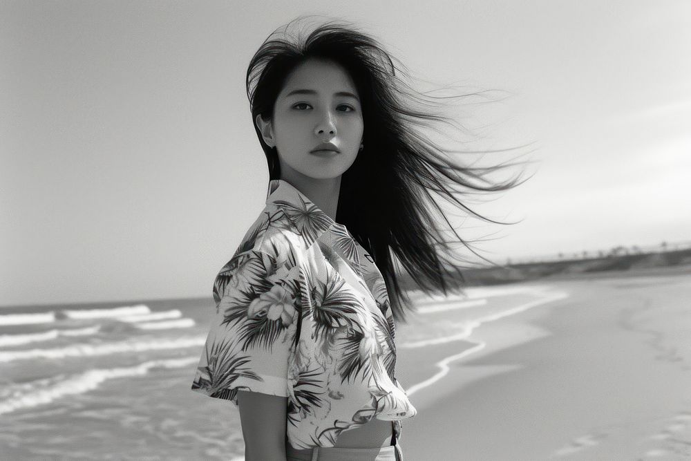 Young asian woman wearing Hawaii shirts beach portrait outdoors.
