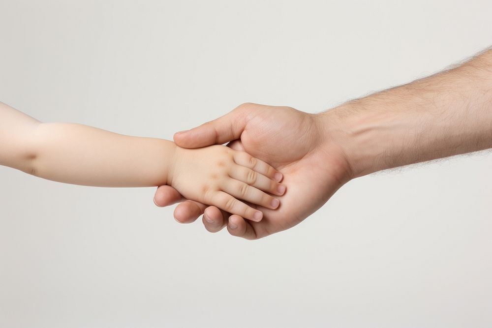 Holding kid hands handshake baby white background.