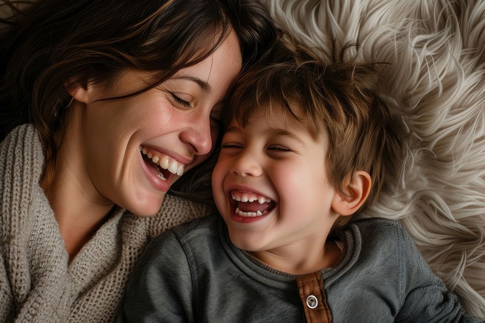 Mother and a son laughing adult smile baby.