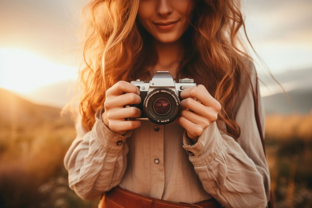 Woman holding camera photography portrait adult.
