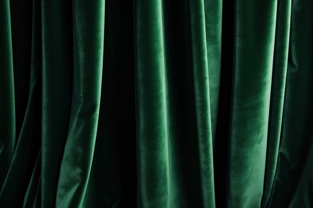 Green velvet curtain backgrounds darkness textured.