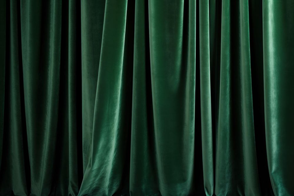 A green velvet curtain backgrounds repetition monochrome.