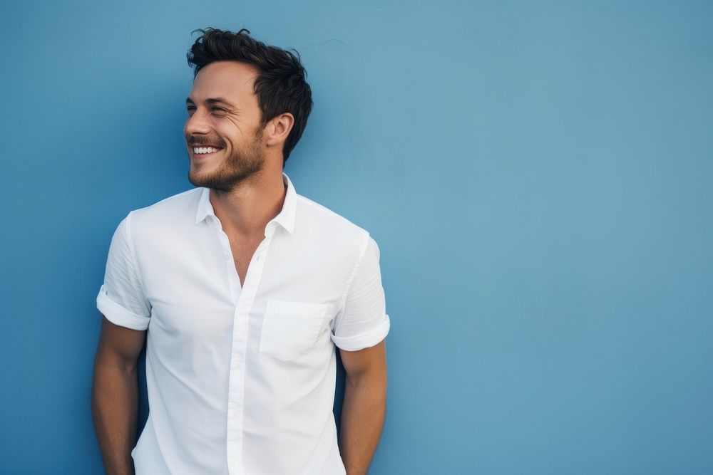 A happy man wearing white t shirt laughing smile adult.