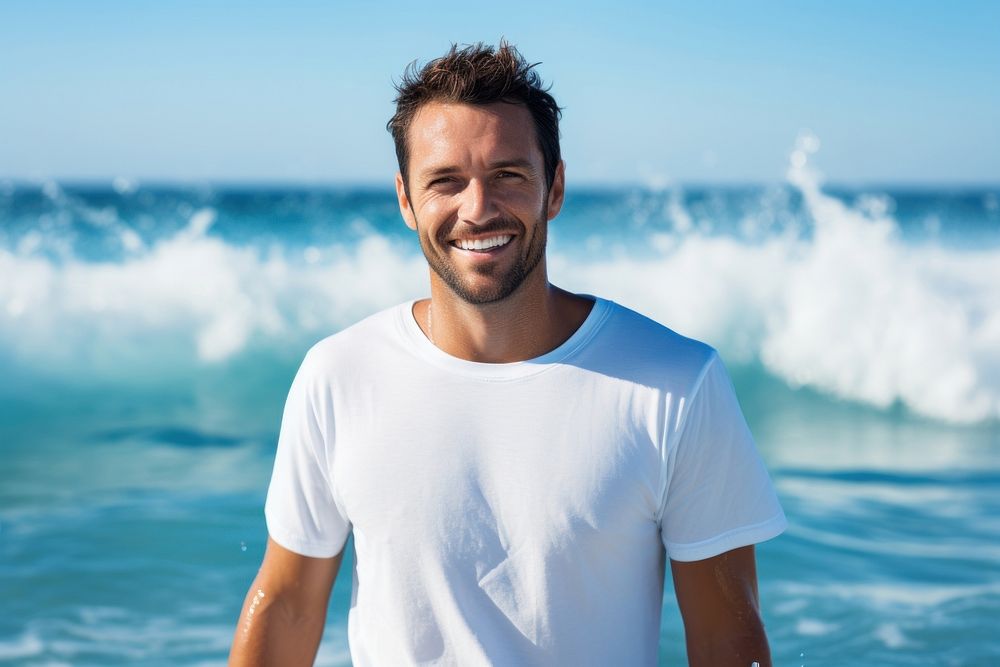 A happy man wearing white t shirt t-shirt smile adult.