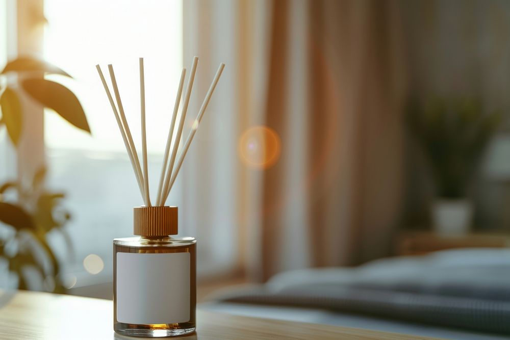 Reed diffuser windowsill container lighting.