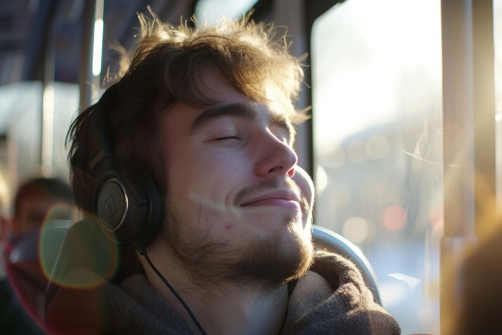 Young man listening music headphones portrait headset.