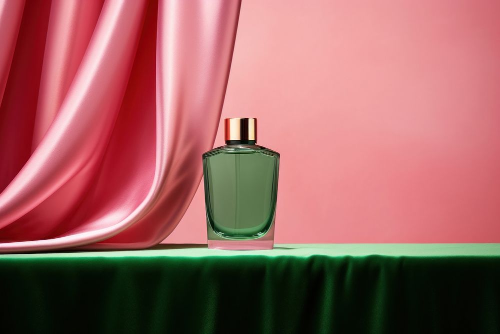 A cosmetic bottle packaging cosmetics perfume green.