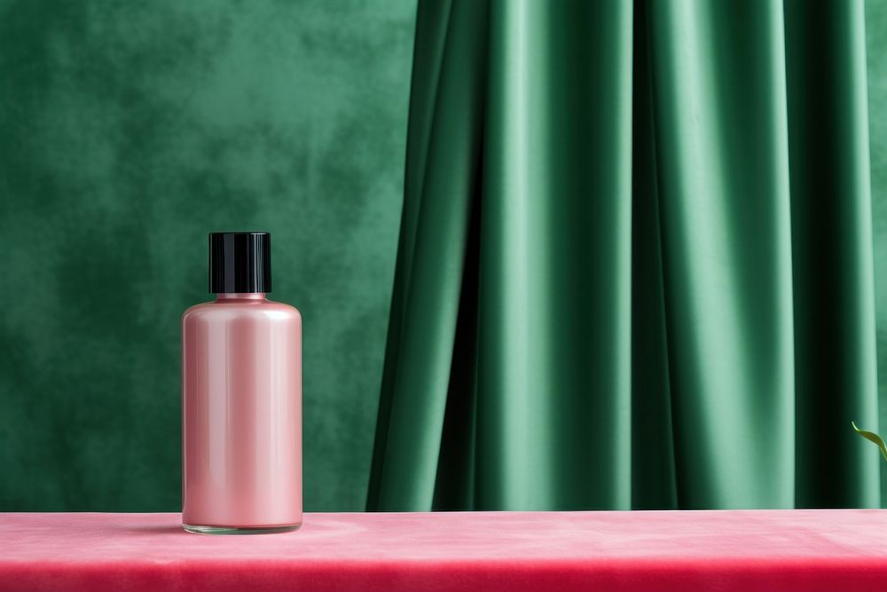 A cosmetic bottle packaging cosmetics curtain green.