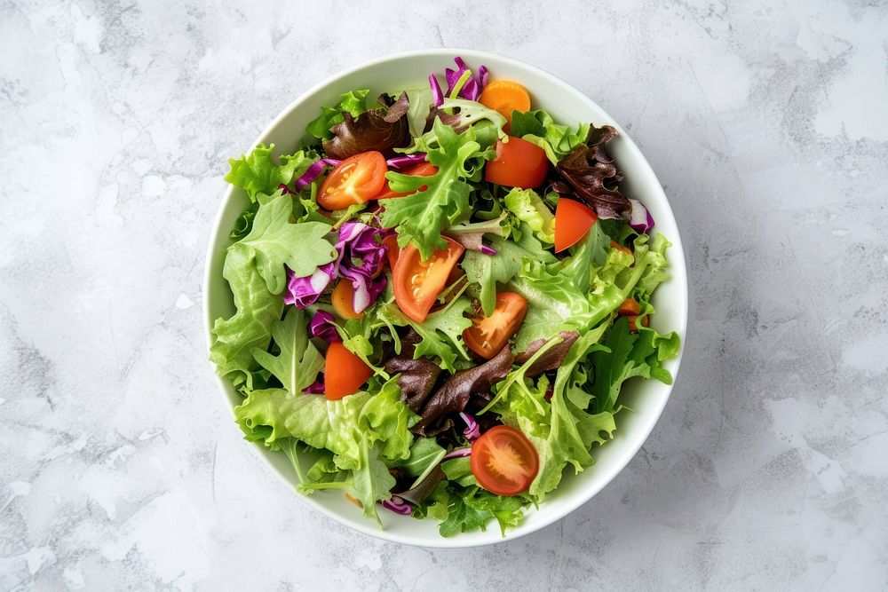 Healthy organic salad plate table food.