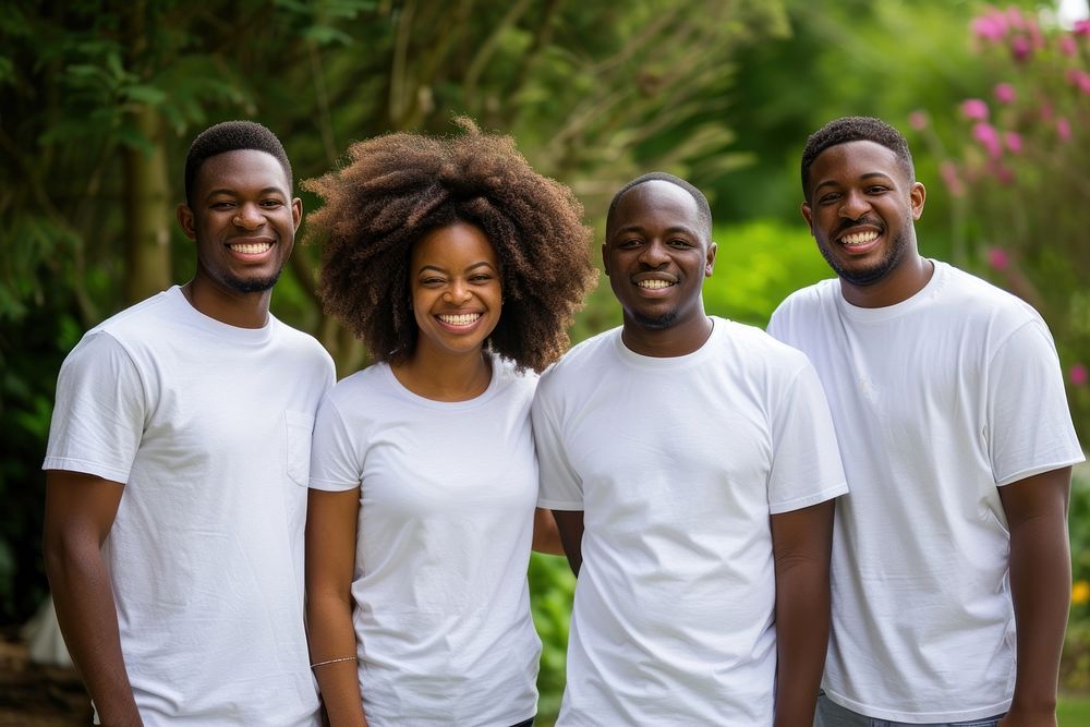 4 volunteer black men and women standing smiling laughing outdoors t-shirt.