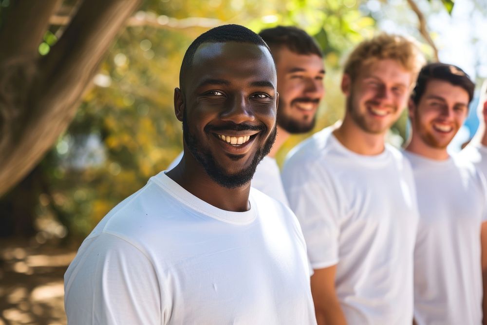 Volunteer men standing smiling outdoors adult smile.