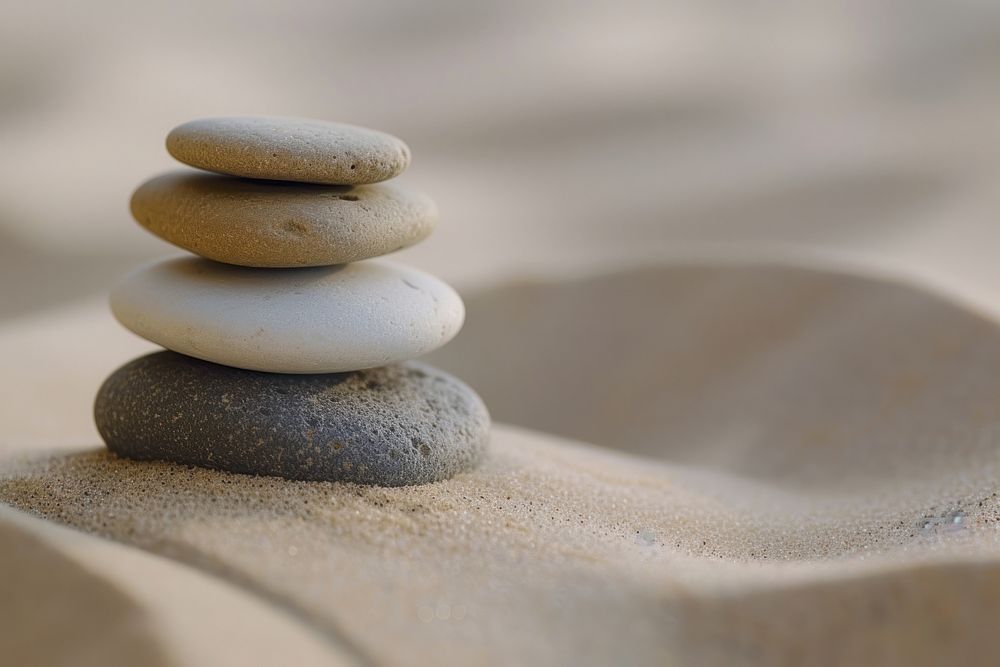Stones stacked pebble sand tranquility.