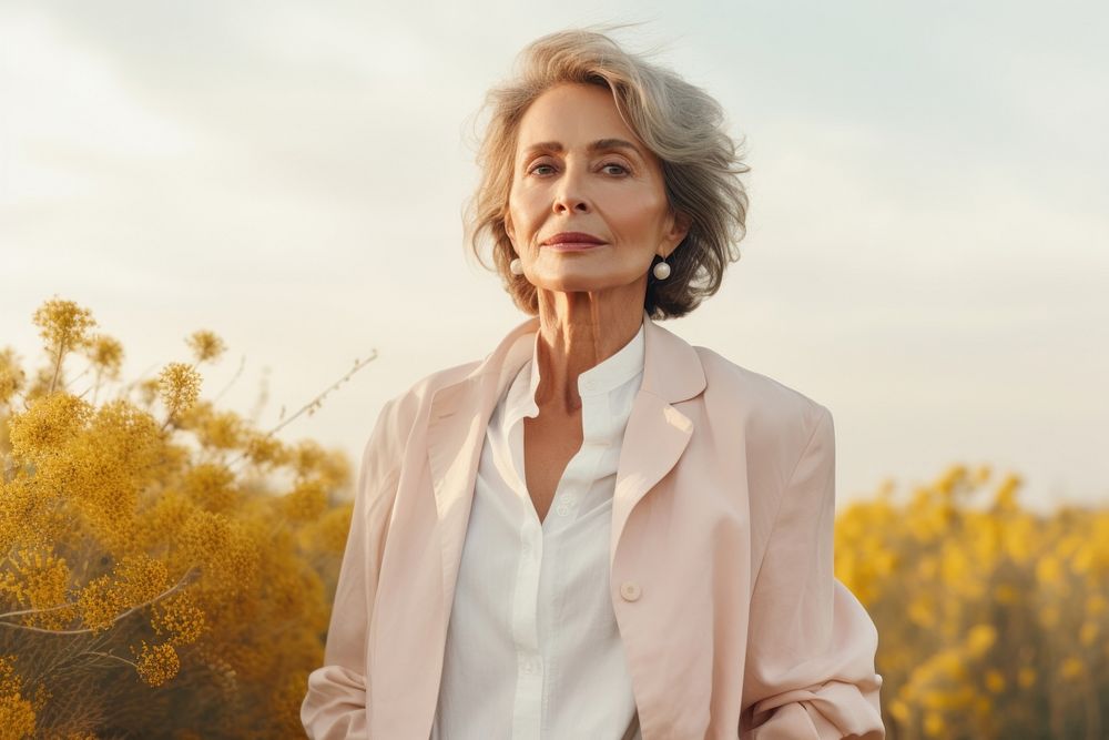 A senior woman wear white portrait outdoors adult.