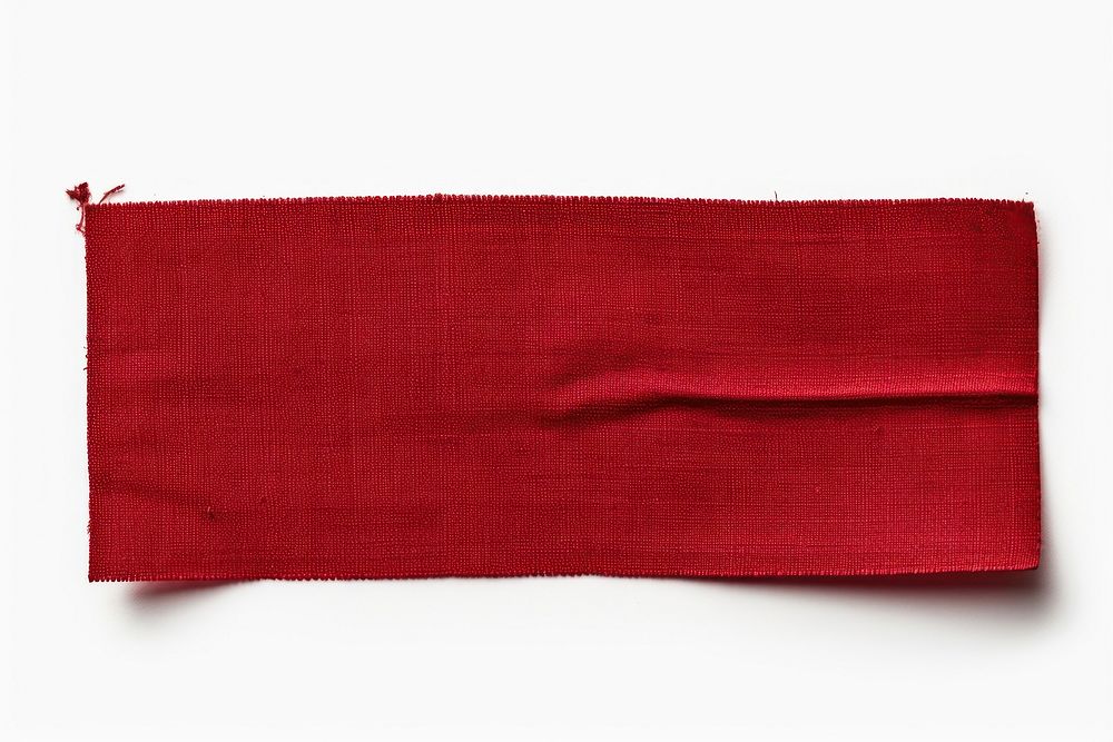 Piece of dark red cloth textile adhesive strip white background accessories rectangle.