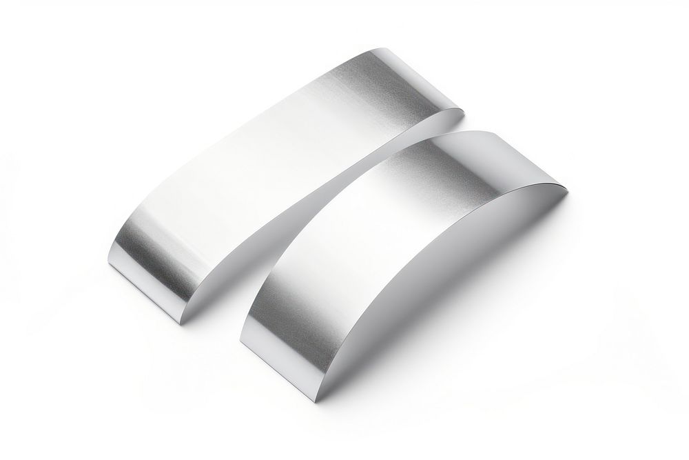 Glossy platinum foil adhesive strip jewelry silver white background.