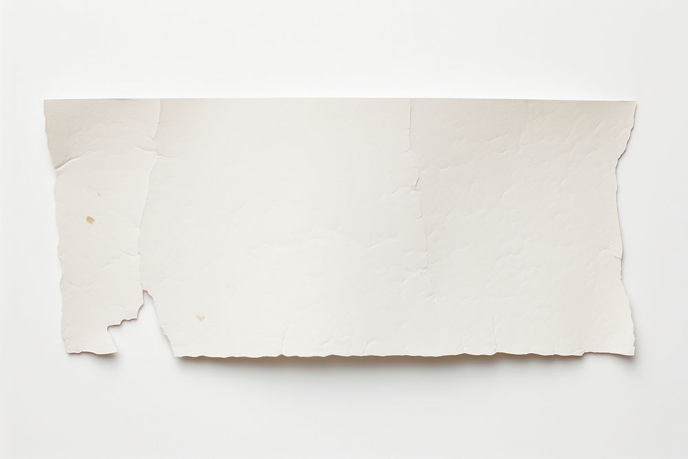 Off-white paper adhesive strip rough white background simplicity.