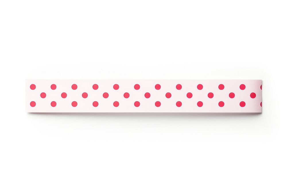 Piece of poka dot paper adhesive strip pattern white background rectangle.